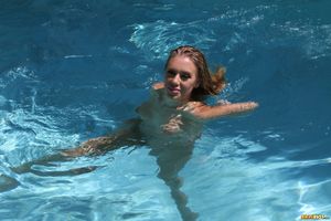 Nicole.Aniston.Floating.On.Polka.Dot.Raft.XXX-47aixxgxnt.jpg